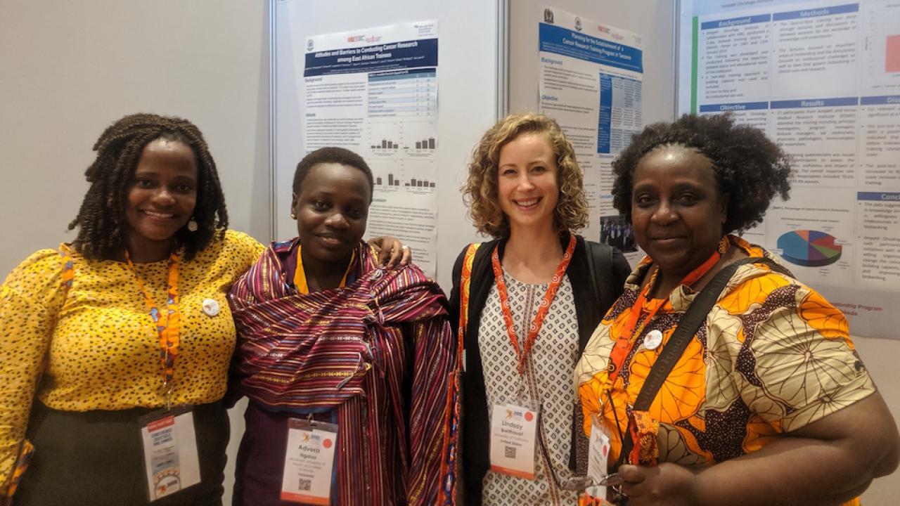 Global Cancer Program Collaboration members at the AORTIC Conference Poster Session (Sarah Kutika, Research Coordinator for MUHAS-ORCI-UCSF Cancer Collaboration; Advera Ngaiza, Pathologist at Muhimbili National Hospital; Lindsay Breithaupt, Program Manager of UCSF Global Cancer Program, and Beatrice Mushi, Program Manager of MUHAS-ORCI-UCSF Cancer Collaboration)