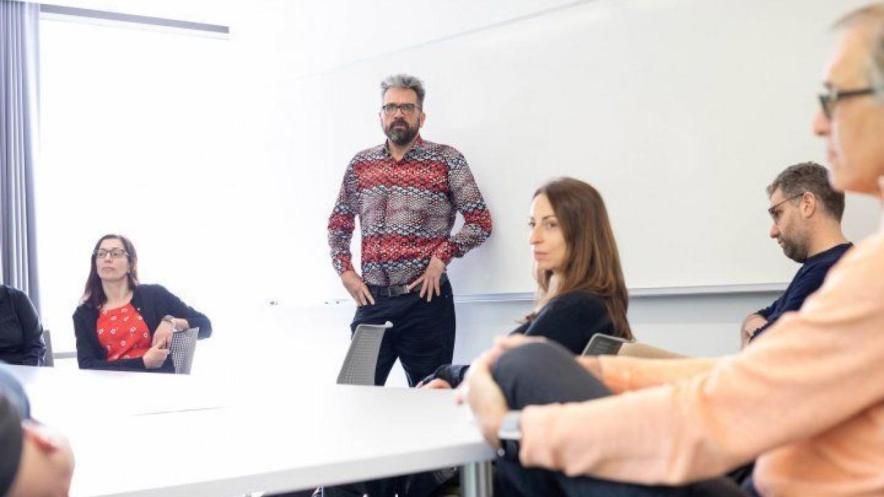 Nevan Krogan (center), PhD, and his collaboration of scientists around the world have fast-tracked efforts to find the proteins in cells that get highjacked by COVID-19. Photo by Susan Merrell