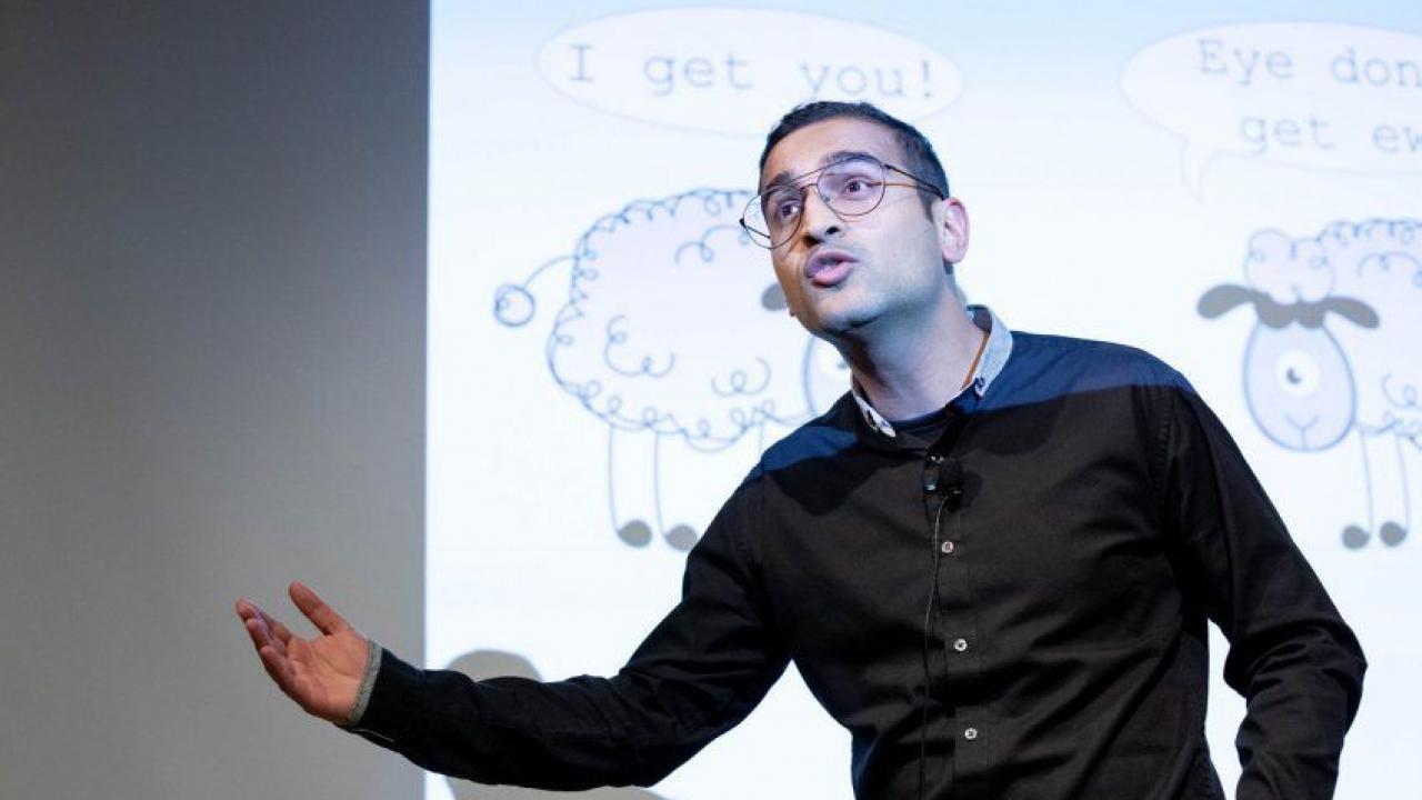 Ishan Deshpande, PhD, delivering his first-place talk at the 2019 UCSF Postdoc Slam. Photo by Susan Merrell