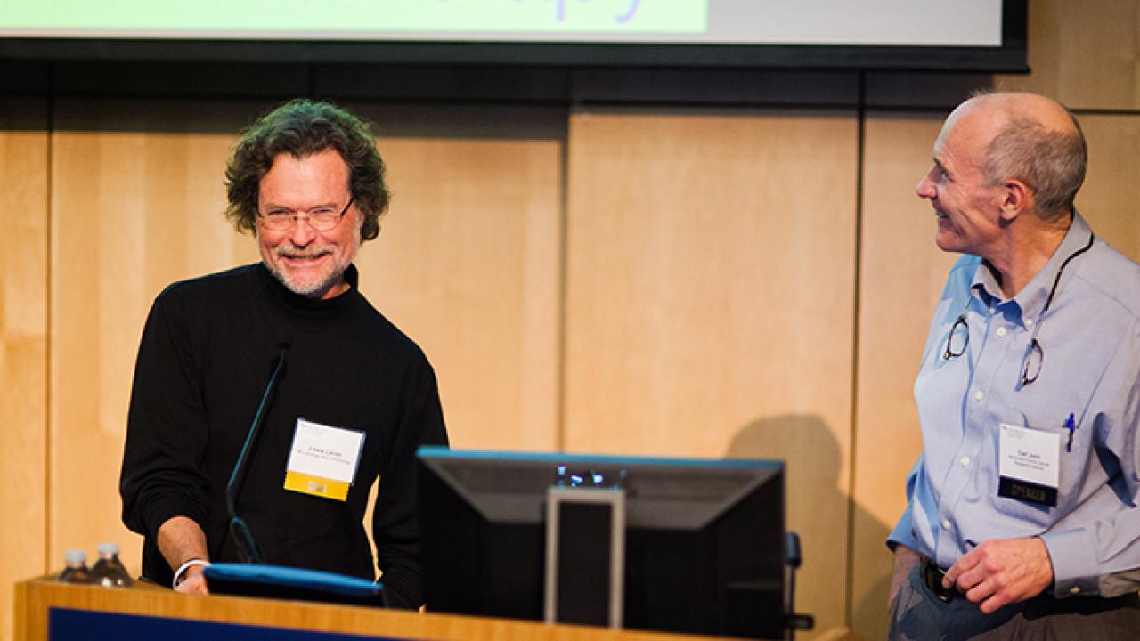 UCSF Organizer Lewis Lanier introduces Abramson Cancer Center immunotherapy pioneer and symposium keynote speaker Carl June at UCSF Helen Diller Family Cancer Center Symposium 2015.