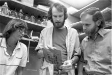 J. Michael Bishop, MD (right), with colleagues in 1989. Photo courtesy of UC San Francisco, Library, University Archives