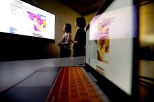 Dr. Scarlett Gomez, left, an epidemiologist and UCSF professor, examines Bay Area cancer rates using California Health Maps with UCSF data scientist Debby Oh on Wednesday, Oct. 2, 2019, at UCSF's Mission Bay campus..(Photo by Noah Berger)