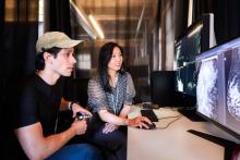 Researchers Adam Yala, PhD (left), and Maggie Chung, MD, co-authors of a study using AI to expedite breast cancer screening for high-risk patients, work in Berkeley on Wednesday, May 20, 2026. Photo by Noah Berger