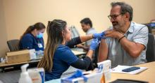 Michael Potter receiving flu shot at UCSF