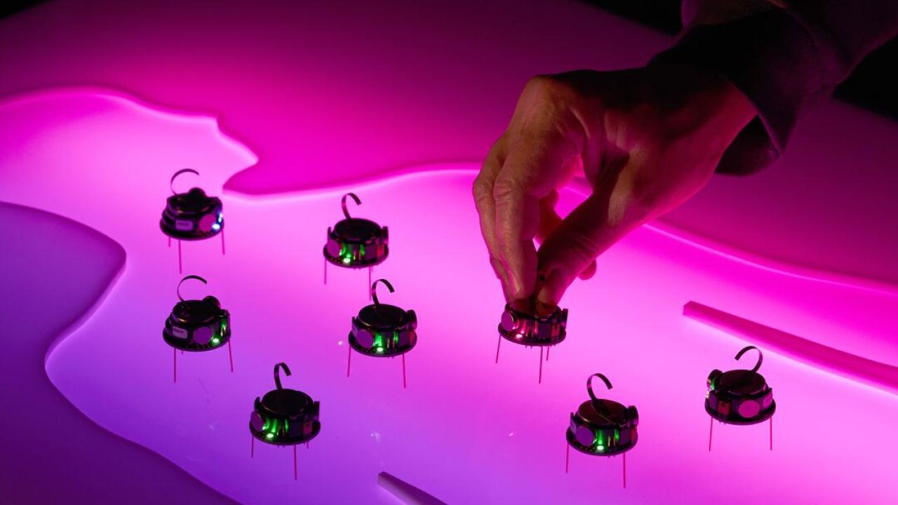 Wendell Lim, PhD demonstrates the cellbots which his team uses for cancer research at UCSF.