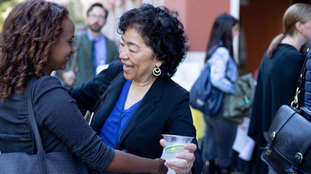 Tatiana Kelil, MD, left, assistant professor of Radiology & Biomedical Imaging, and Nola Hylton, PhD, professor in residence in the department of Radiology, visit during the informational kiosk portion of the Faculty Development Day conference. Photo by Susan Merrell atiana Kelil, MD, left, assistant professor of Radiology & Biomedical Imaging, and Nola Hylton, PhD, professor in residence in the department of Radiology