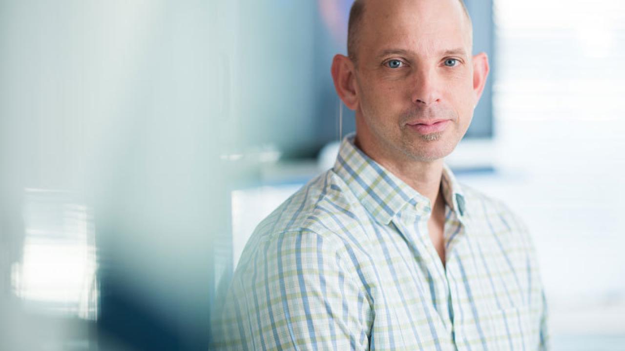 Max Krummel, PhD, in his Health Science West lab at the UCSF Parnassus Campus. Image credit: Maurice Ramirez 2017