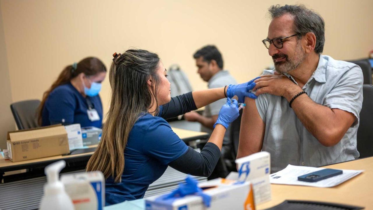Michael Potter receiving flu shot at UCSF
