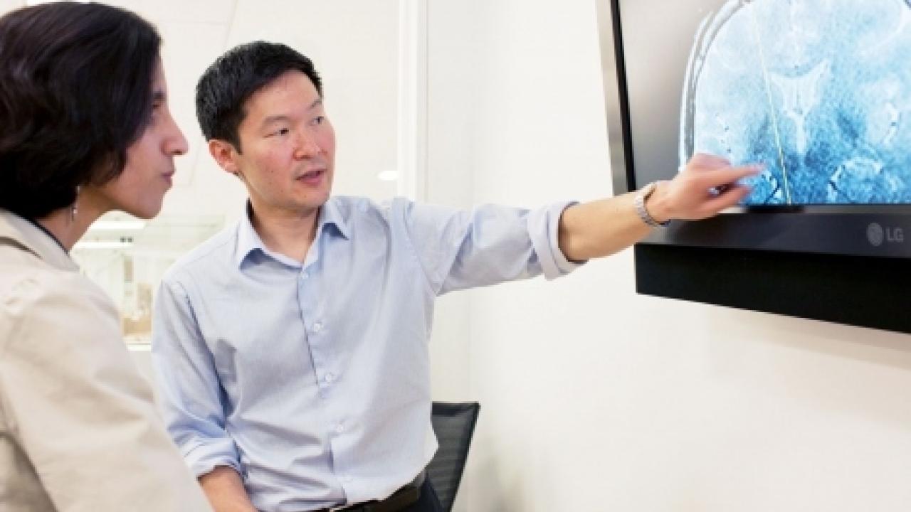 Daniel Lim (right), MD, PhD, is part of the UCSF team collaborating with Pfizer on developing a treatment for malignant brain tumors in young children due to a genetic mutation. Photo by Bruce DaSilva