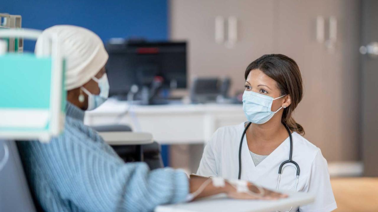 woman receiving chemotherapy in a clinic