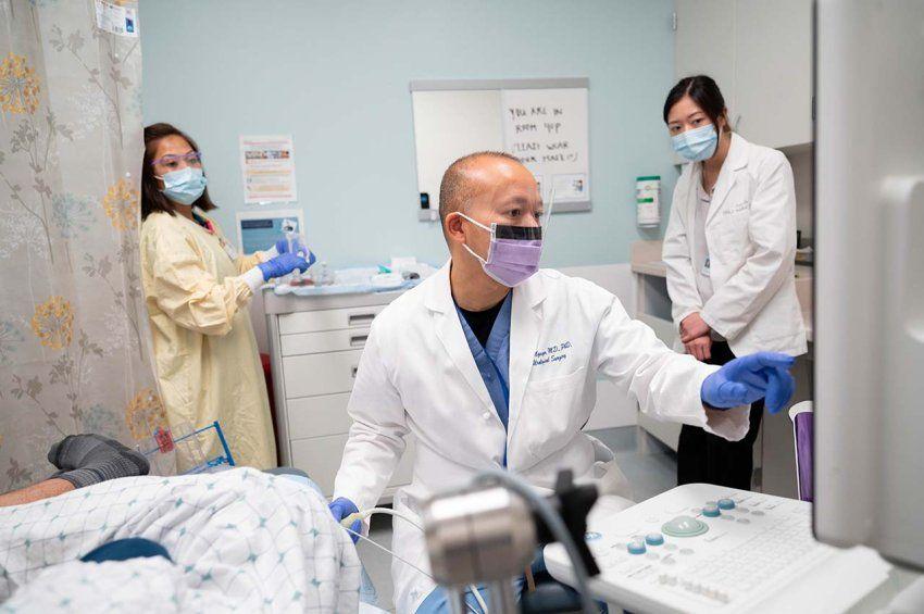 Hao Nguyen conducts and MRI at UCSF