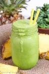frosty green beverage in a mason jar