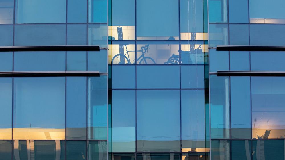 Window reflection of lab and offices at Byers Hall building