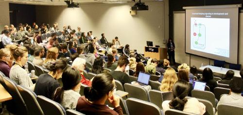 audience in large UCSF classroom. Images courtesy of Jordan Briscoe and Jeroen Roose.