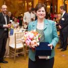 Dr. Rena Pasick at the Women Health Care Executives 2014 Woman of the Year award presentation as UCSF colleague Dr. Mack Roach looks on. Dr. Rena Pasick at the Women Health Care Executives 2014 Woman of the Year award presentation as UCSF colleague Dr. Mack Roach looks on.